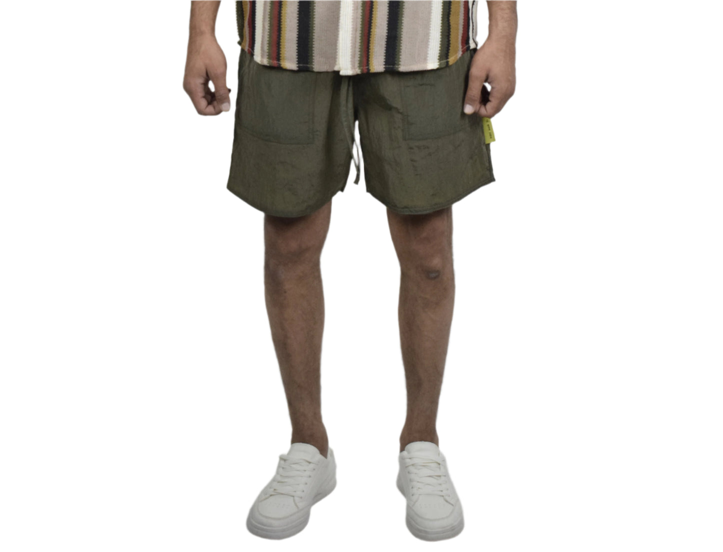 Person wearing a striped shirt and shorts on a white background