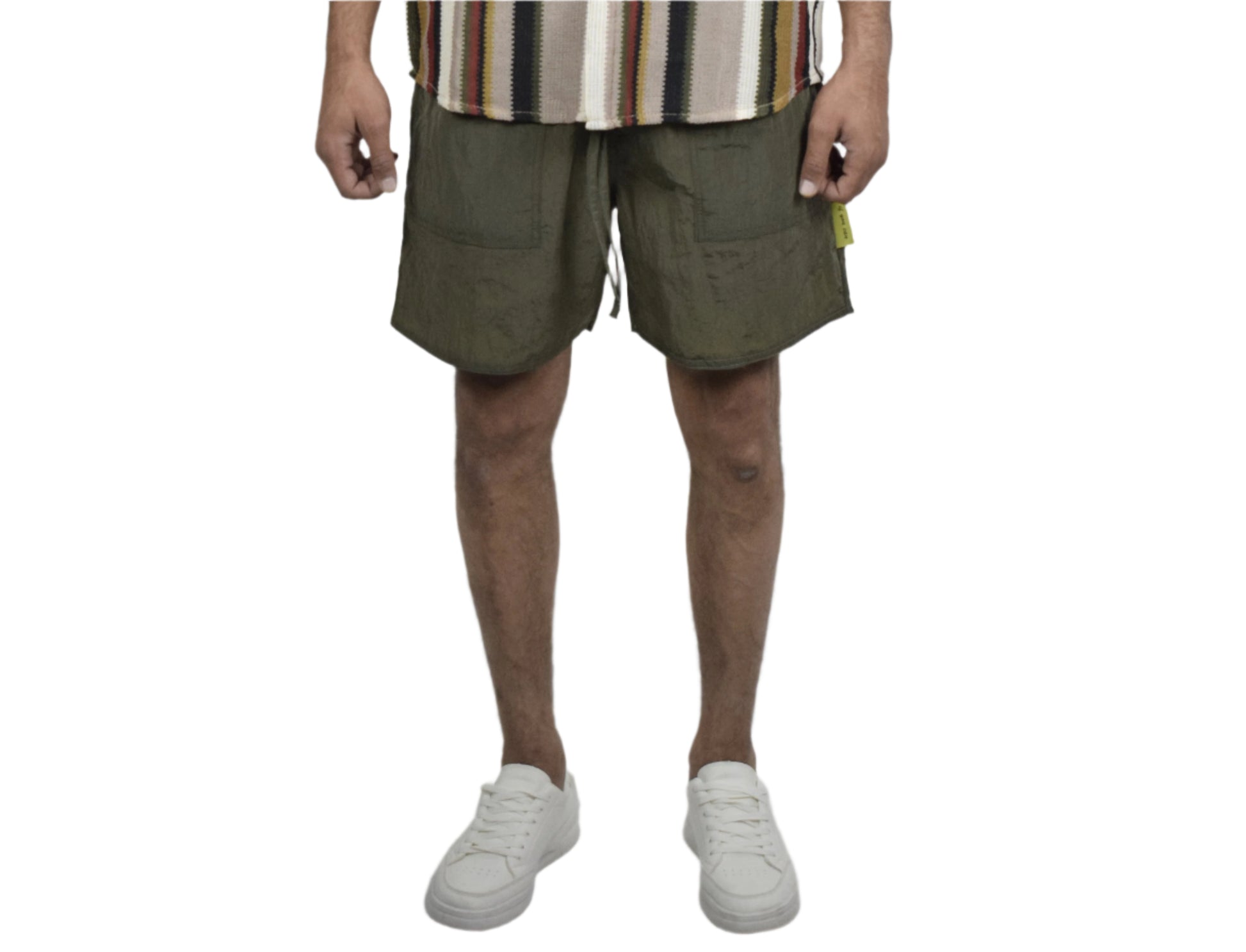 Person wearing a striped shirt and shorts on a white background